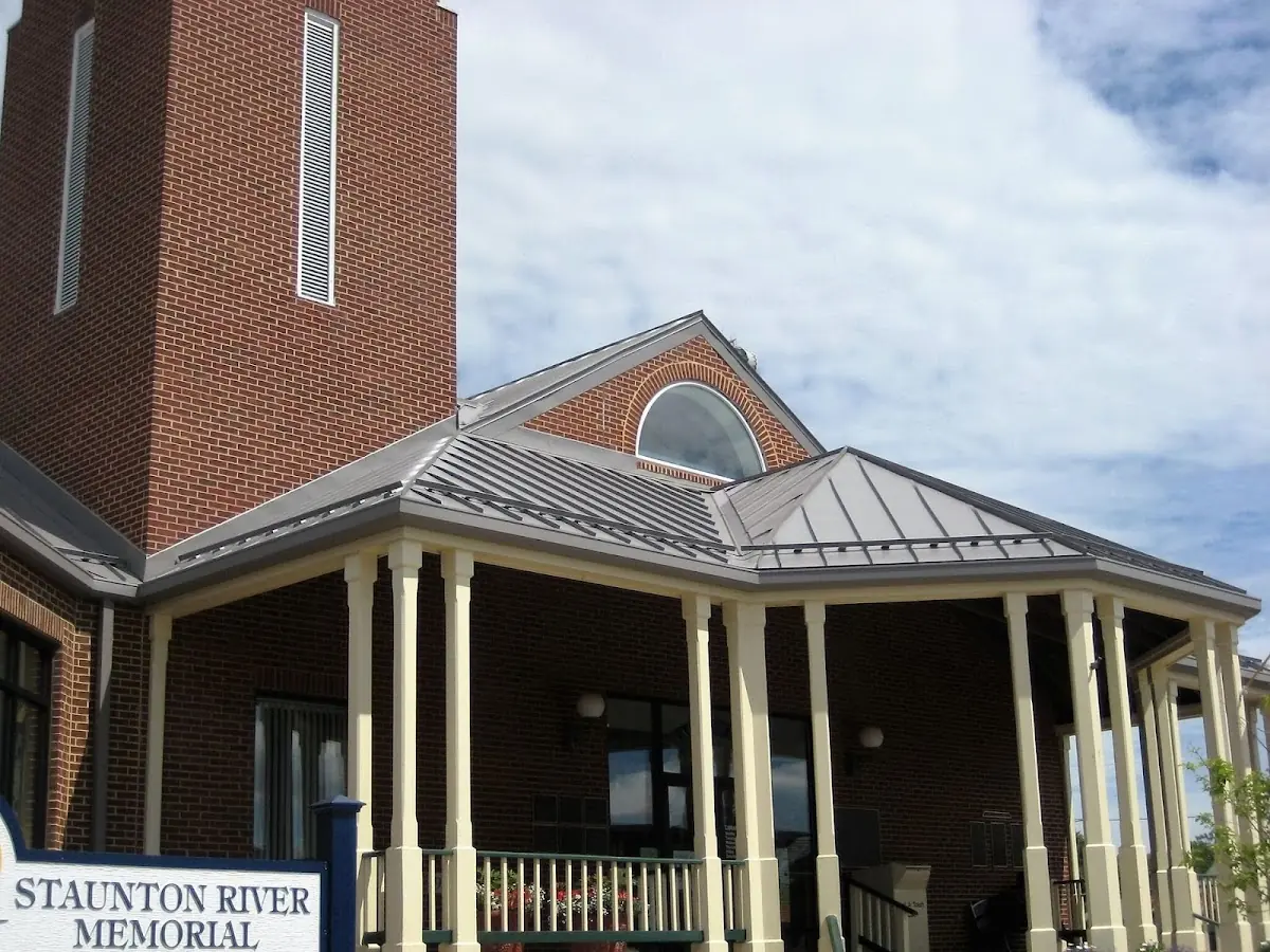 Skilled roofing craftsmen working on a residential roof in Ridgway